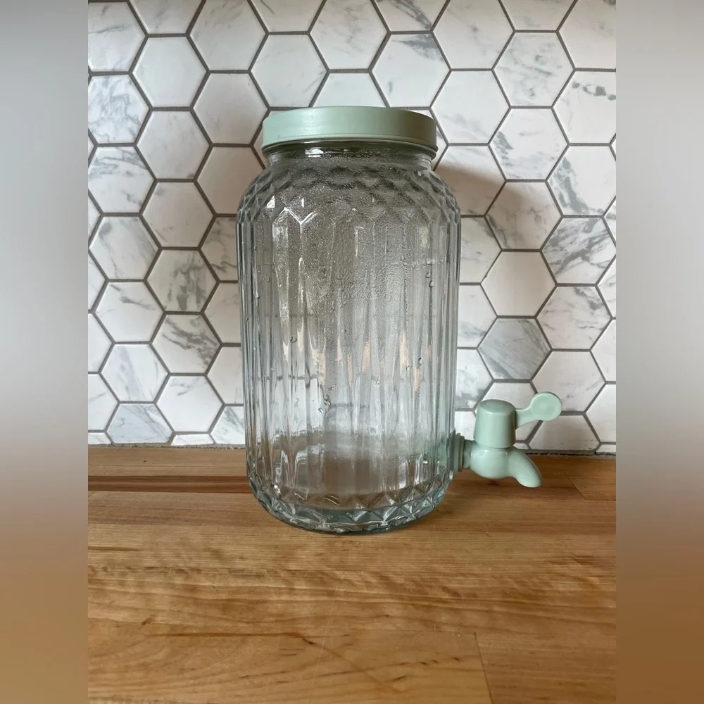 IKEA Clear Glass Beverage Dispenser with Green Lid and Spout